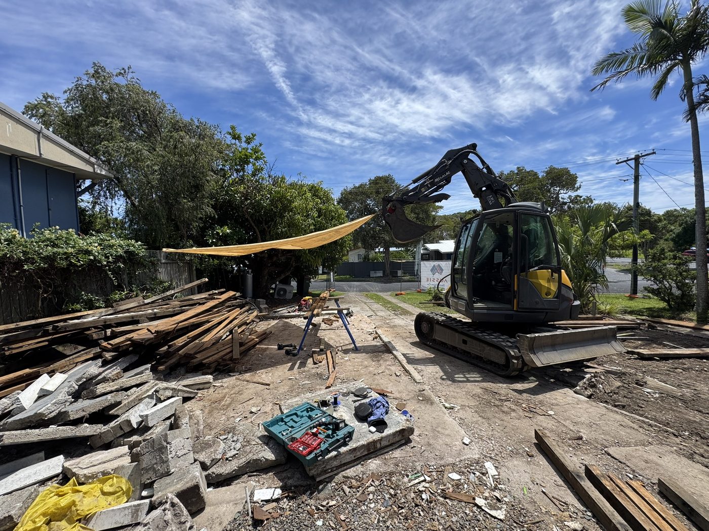 Demolition timber stacked for salvage, Dillon St, Sawtell